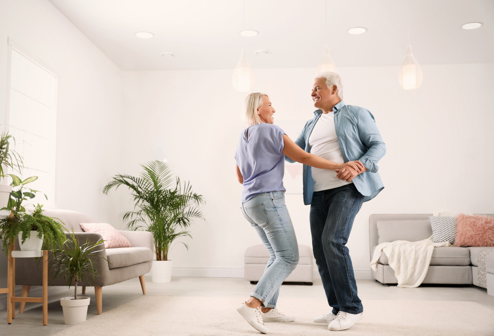 Older couple dancing as one of the indoor exercises